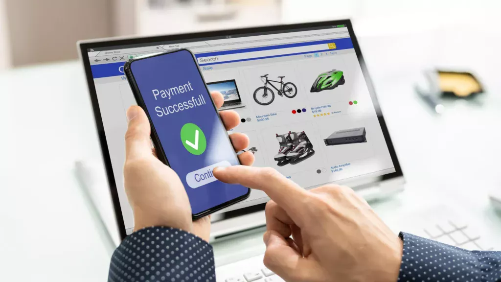 Successful payment confirmation on phone, illustrating the impact of SEO Agencies for E-Commerce Websites on sales.